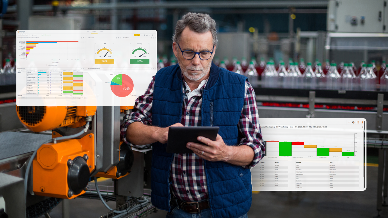 Worker on the shop floor looking at data on his tablet with Shoplogix analytics