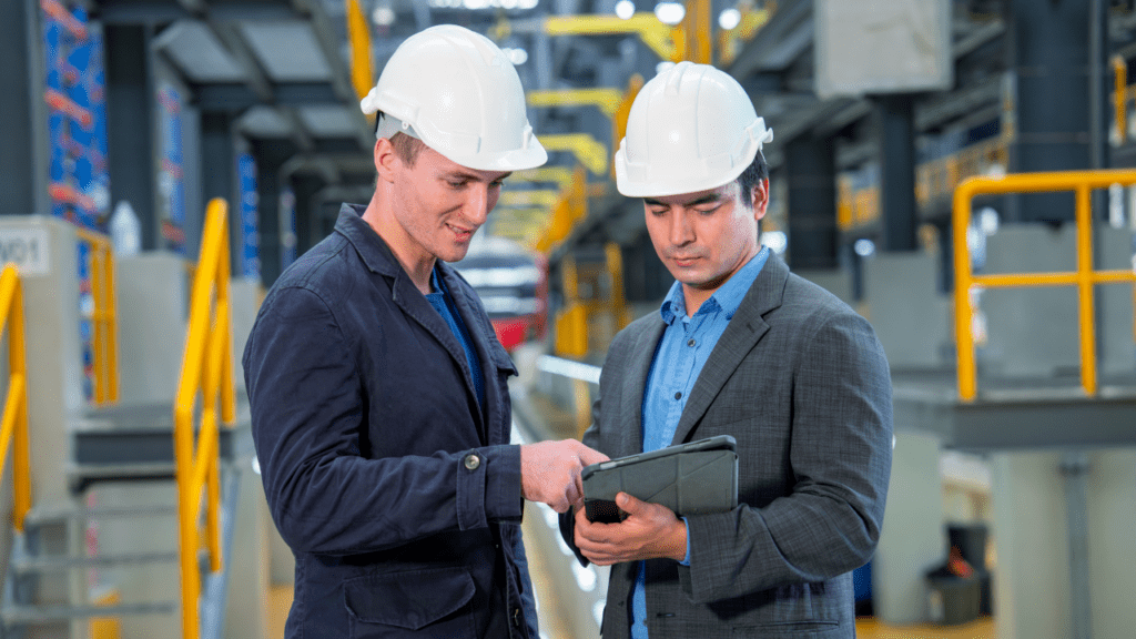 men in safety equipment at work